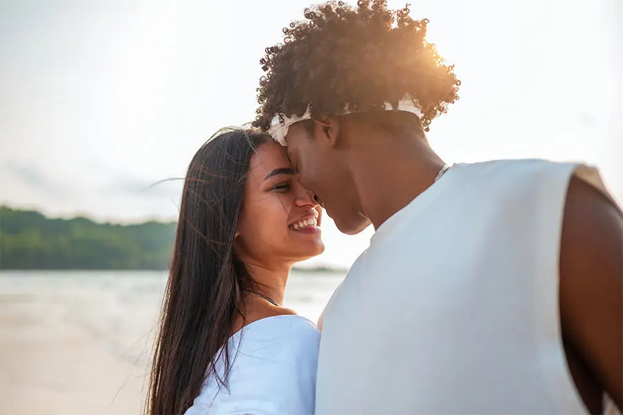 Young couple touching eachothers forehead