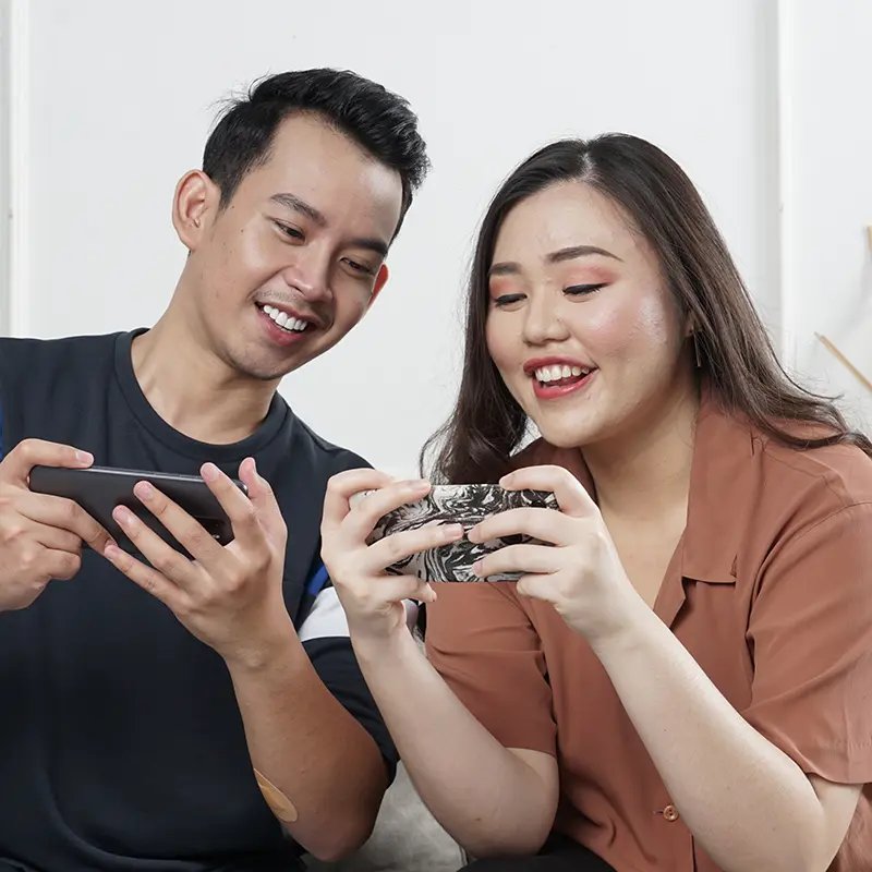 Young people browsing their phones